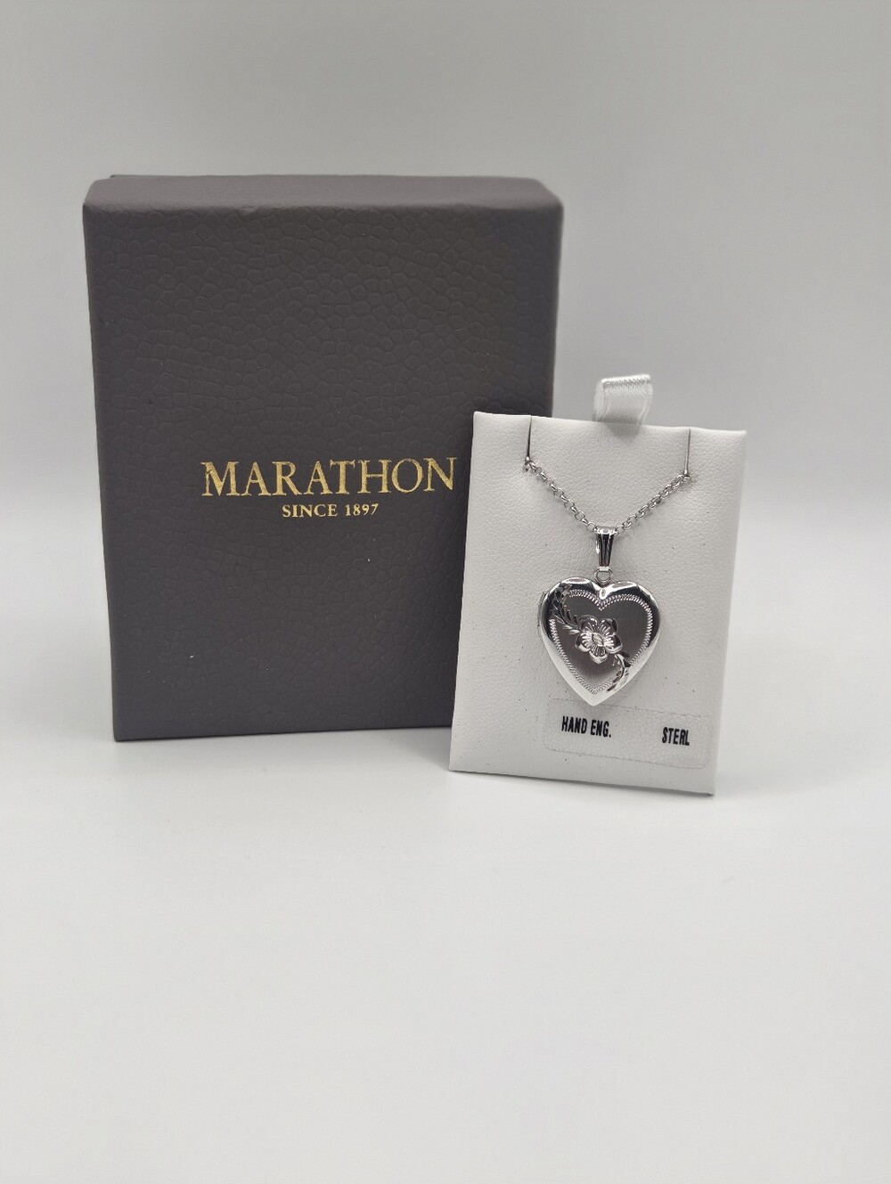 Marathon Hand Engraved Heart Locket